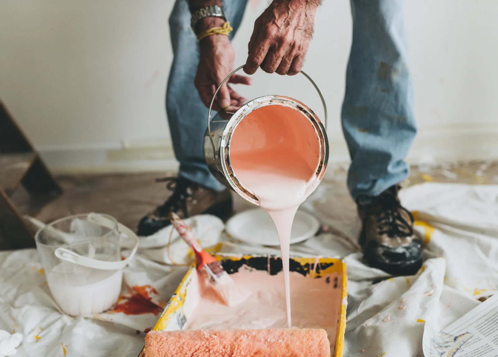 Decorator renovating indoor walls